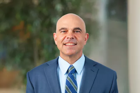 A professional portrait of Jeff Nelson.