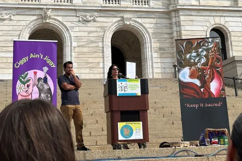 Speakers at a podium on the Capitol steps during Traditional Tobacco Day 2025