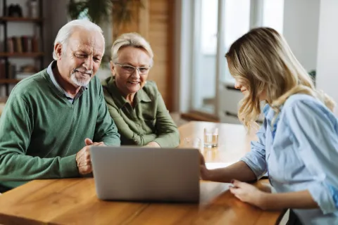 Advisor helping senior couple