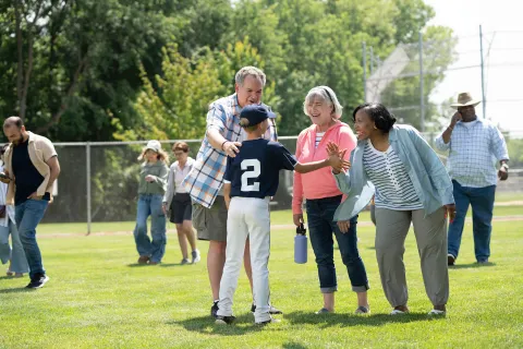 Seniors at youth baseball game