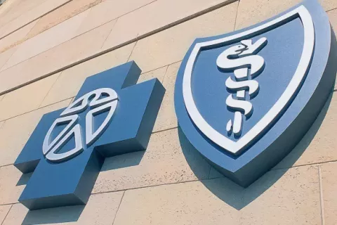 Blue Cross and Blue Shield cross and shield on building