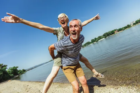 A couple enjoys a day at the beach.