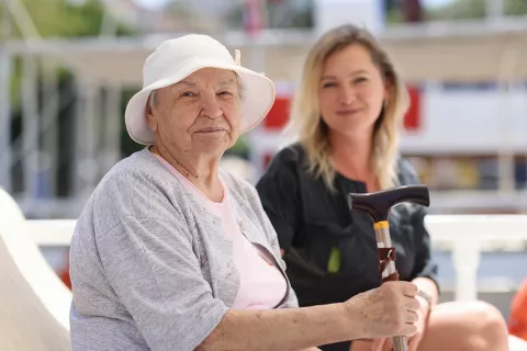 A woman with her caregiver.