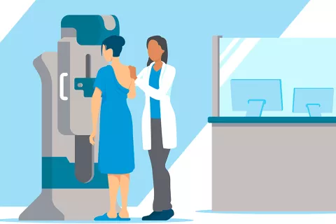 Woman receives a mammogram.