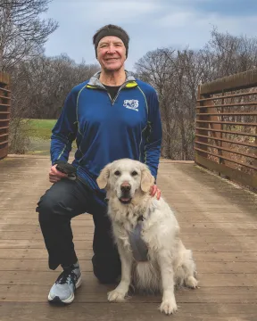 Mike with his dog Maddie.