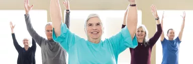 A group practices yoga.