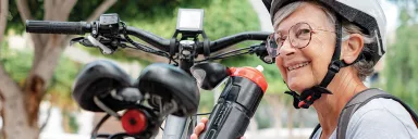 Woman takes a break from cycling.