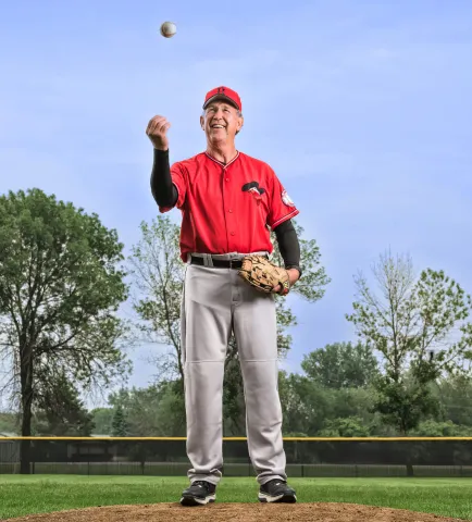 Blue Cross and Blue Shield of MN member Bob Britz on the pitching mound.