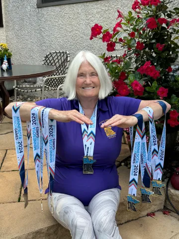 Patsy Lillehei displaying her medals.